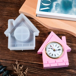 Detailed bird house silicone mold and finished pink resin clock with Roman numerals