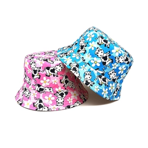 Chapeaux de soleil pour enfants motif vache et marguerites en rose et bleu pour l'été