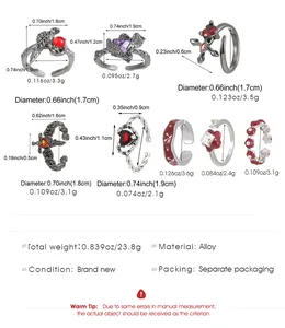 Size chart showing gothic thorn raven rings and cross earrings with dimensions and weights