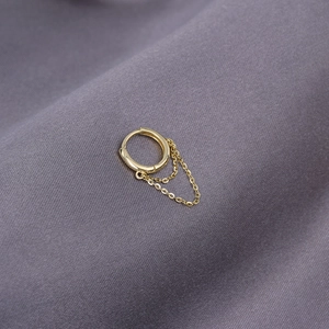 Minimalist S925 silver hoop earring with double gold chain tassels on purple fabric