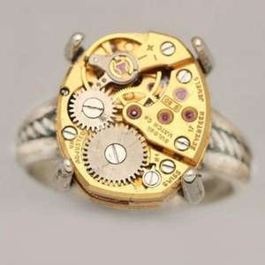 Steampunk men's ring featuring a vintage 17 jewels mechanical watch movement gear