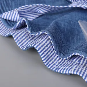 Detail of the blue fabric sun hat brim with flexible memory wire and striped lining