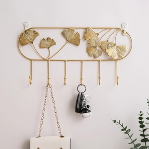 Golden ginkgo leaf iron wall hooks for entryway key storage and luxury decor
