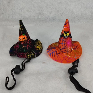 Detail of Halloween pet wizard hats with spider web patterns and adjustable elastic straps
