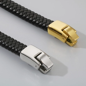 Detail of woven leather bracelets with gold and silver magnetic steel clasps