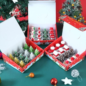 Detailed gift box set featuring 12 pieces of festive Santa and snowman tea light candles