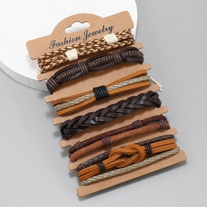Set of 6 vintage braided leather bracelets in earth tones on a professional grey background
