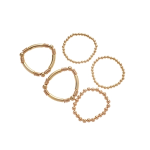 Ensemble de cinq bracelets dorés avec fleurs étoiles et perles élastiques pour femmes