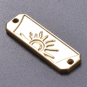 Macro shot of 18k gold plated rectangular sun pendant showing detail and texture