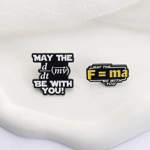 Minimalist physics formula enamel pin set with Force quote on black background