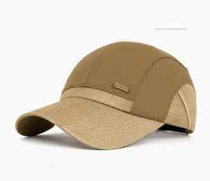 Detail showing breathable khaki mesh panels and metallic logo on the outdoor sports cap
