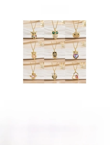 Detailed grid showing nine crystal owl pendant necklaces in various eco-copper styles