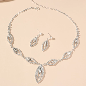 Elegant sparkling rhinestone bridal jewelry set with leaf pendants and marquise cut crystals