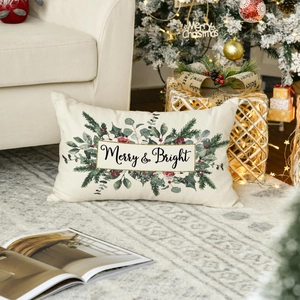 Close-up of linen Christmas pillow case with Merry & Bright print in cozy holiday decor