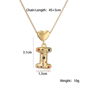 Macro view of gold-plated letter I pendant with colorful zircons and size specifications