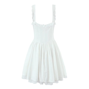 Close-up detail of white mini dress featuring delicate lace trim and ruffled edges