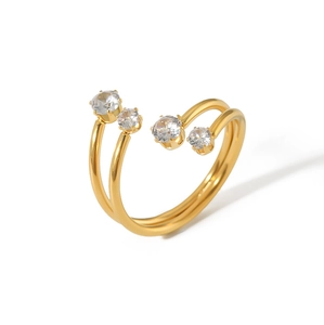 Detail of double-layered open ring in gold plating with four sparkling round zircons