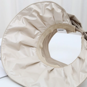 Beige wide brim sun visor hat with UV protection coating and elegant back bow decoration
