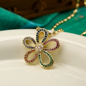 Exquisite gold floral pendant necklace with colorful zircon stones on ceramic setting
