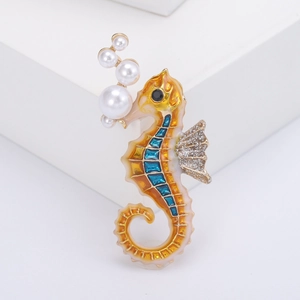 Cartoon seahorse brooch in gold alloy with colorful enamel and decorative pearls