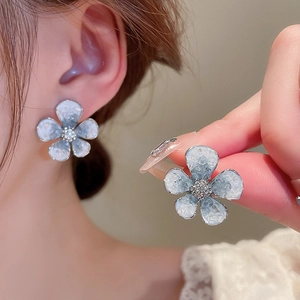 Elegant ice blue flower stud earrings with crystals and pearl texture for women