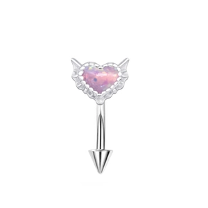 Detail of silver heart-shaped opal eyebrow ring with small wings and cone spike end