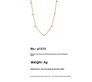 Detail of pink irregular freshwater pearl necklace with stainless steel gold chain