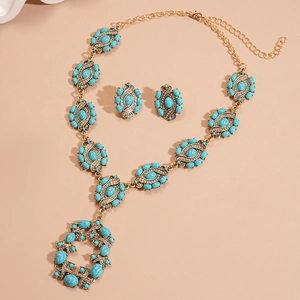 Parure collier vintage dorée avec pierres en résine bleu lapis et cristaux brillants
