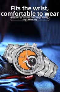 Detail of Pin Time watch featuring a striking orange dial and silver wavy link band