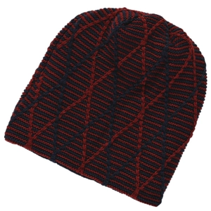 Fleece lined knit beanie with red and navy blue spider web pattern for winter warmth