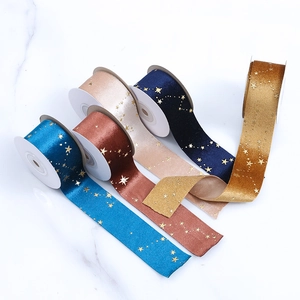 Assorted gold-stamped velvet ribbons with star patterns in five elegant colors
