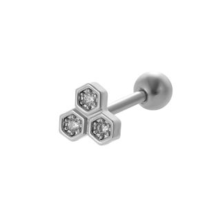 Detailed macro view of silver stainless steel honeycomb stud earring with clear zircons
