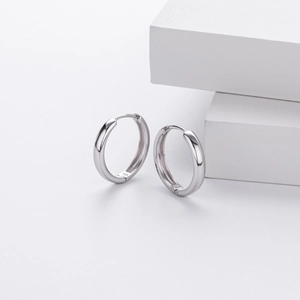 Detail view of 925 sterling silver hoop earrings with clear hallmark engraving