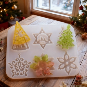 Christmas silicone resin mold featuring snowflakes and stars on rustic wood background
