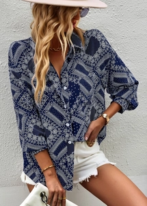 Detail of dark blue paisley print long sleeve shirt with lapel and white buttons