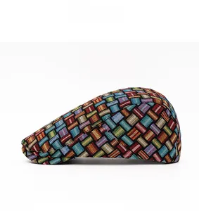Side view detail of vintage plaid flat cap showing colorful textured jacquard weave