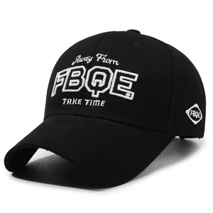 Classic black cotton baseball cap with white embroidery and curved brim on white background