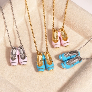 Delicate ballet shoe pendant necklaces in pink and blue on gold or silver O-chains