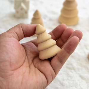 Miniature wooden Christmas tree ornament in natural solid wood for Nordic table decor