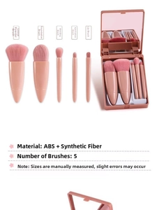 Detailed view of 5-piece pink travel makeup brush set with compact mirror storage case