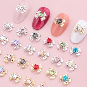 Bowknot heart crystal nail art charms in gold and silver alloy for DIY manicure