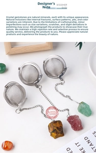 Detail of 304 stainless steel tea infuser with natural raw amethyst gemstone charms