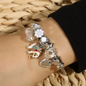 Silver twisted bangle with enamel elephant charm, crystal beads, and heart pendant