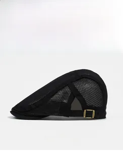 Detail of black mesh flat cap featuring breathable fabric and metal side buckle adjustment