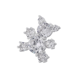Macro detail of silver bear stud earring featuring sparkling inlaid gemstones on white background