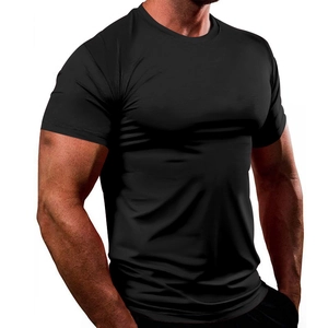 Close-up of black slim fit crew neck t-shirt showing breathable fabric on male model