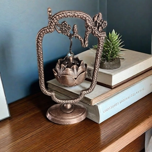 Antique bronze crane hanging incense burner with lotus design and vintage metal finish