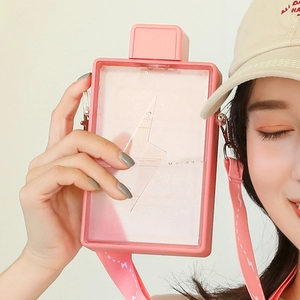 Pink rectangular plastic water bottle with lightning pattern and adjustable crossbody strap