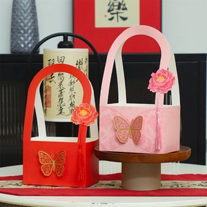 Exquisite hollow Chinese paper gift basket with floral charms and butterfly 3D accents