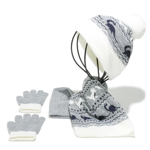 Close-up of boys' dinosaur knit hat, scarf, and gloves set with Nordic geometric patterns